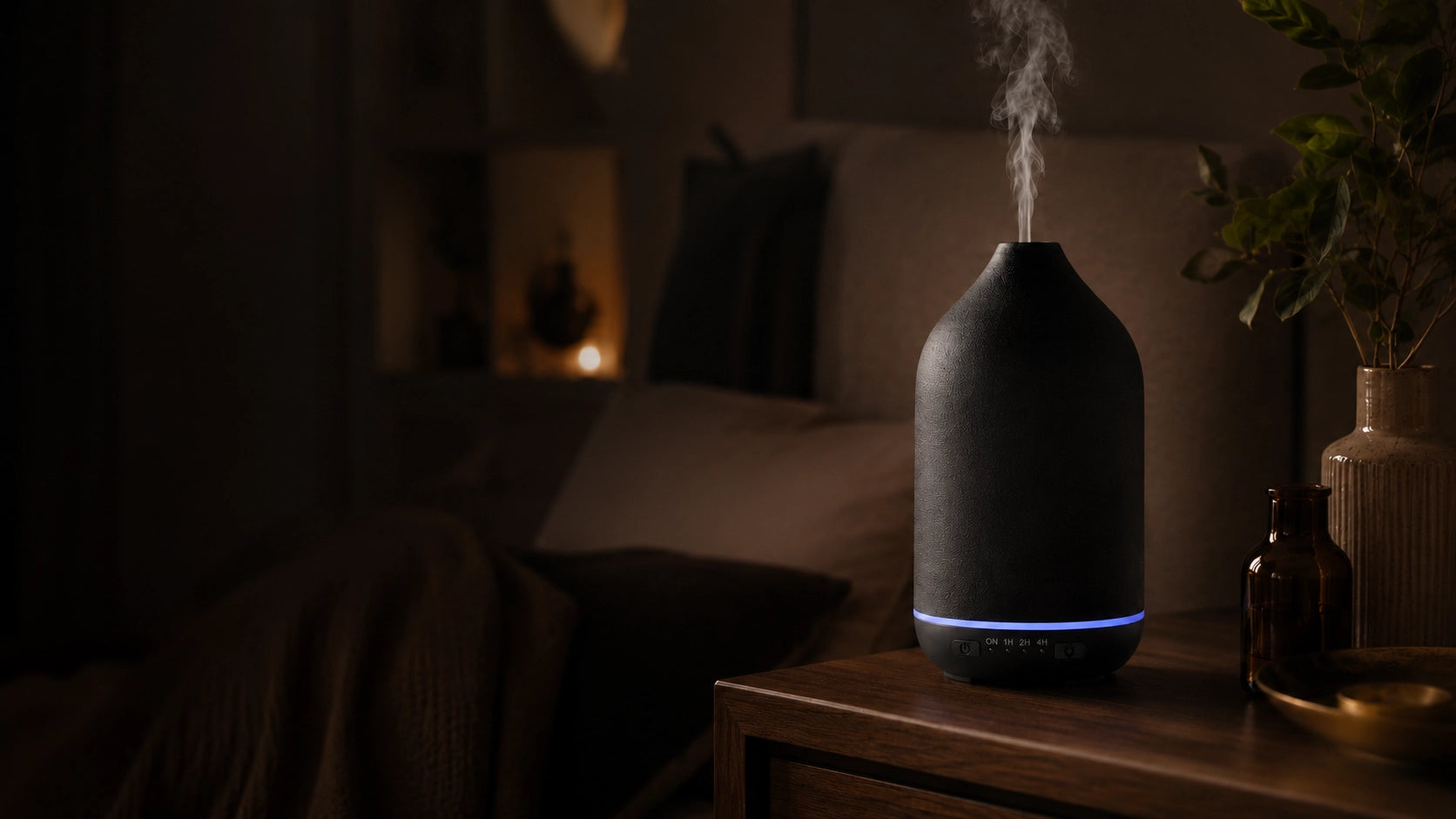 Black ceramic diffuser glowing with ambient LED light