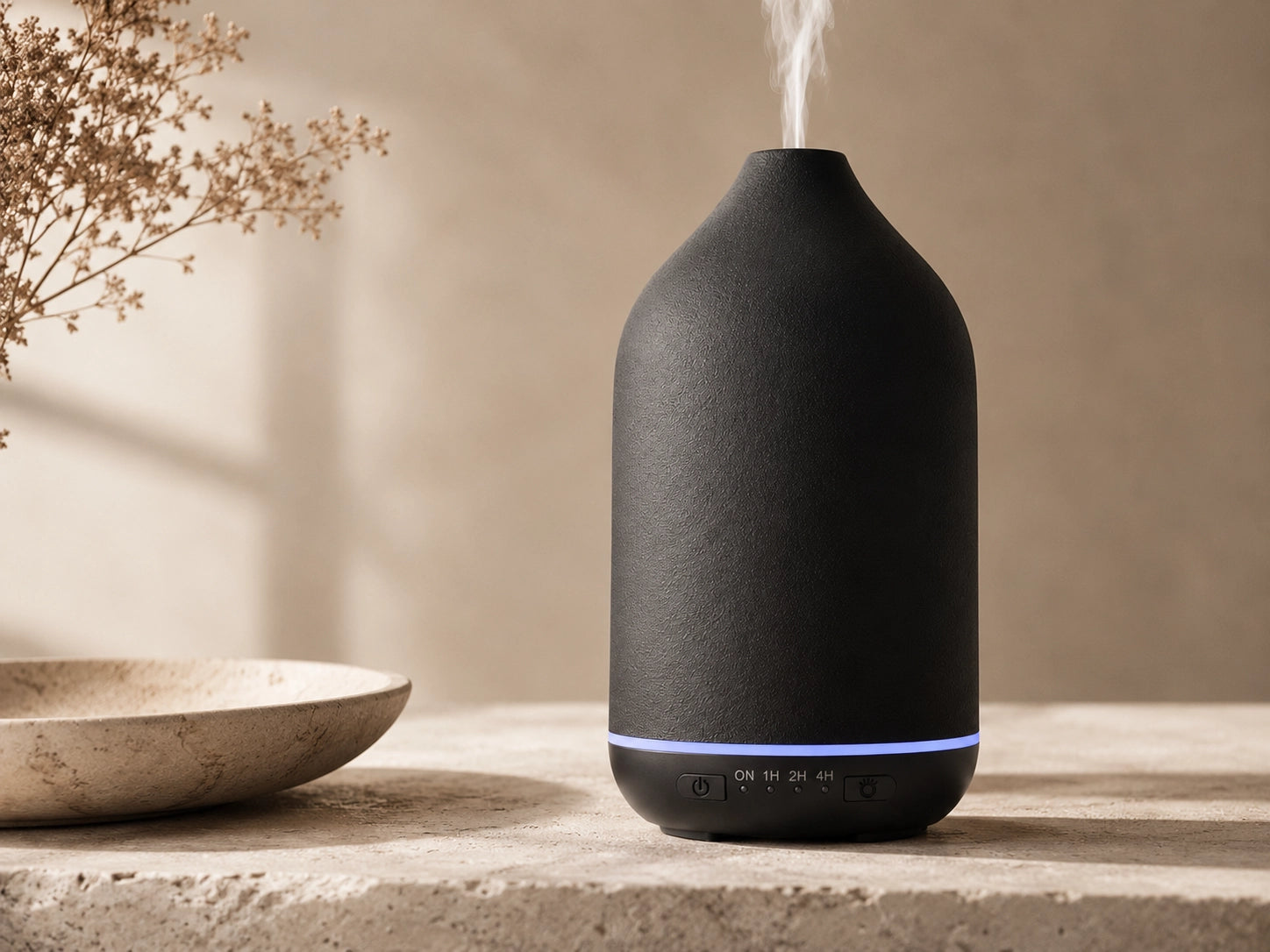 Close-up of textured black ceramic essential oil diffuser