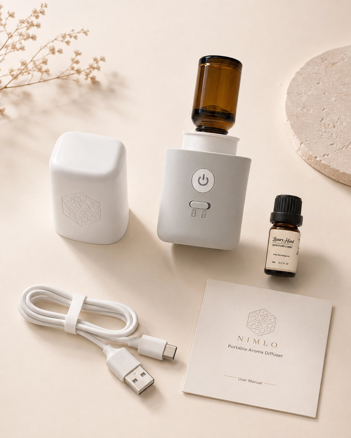 NIMLO diffuser, 5ml Hotel White Tea fragrance, USB-C cable and user manual