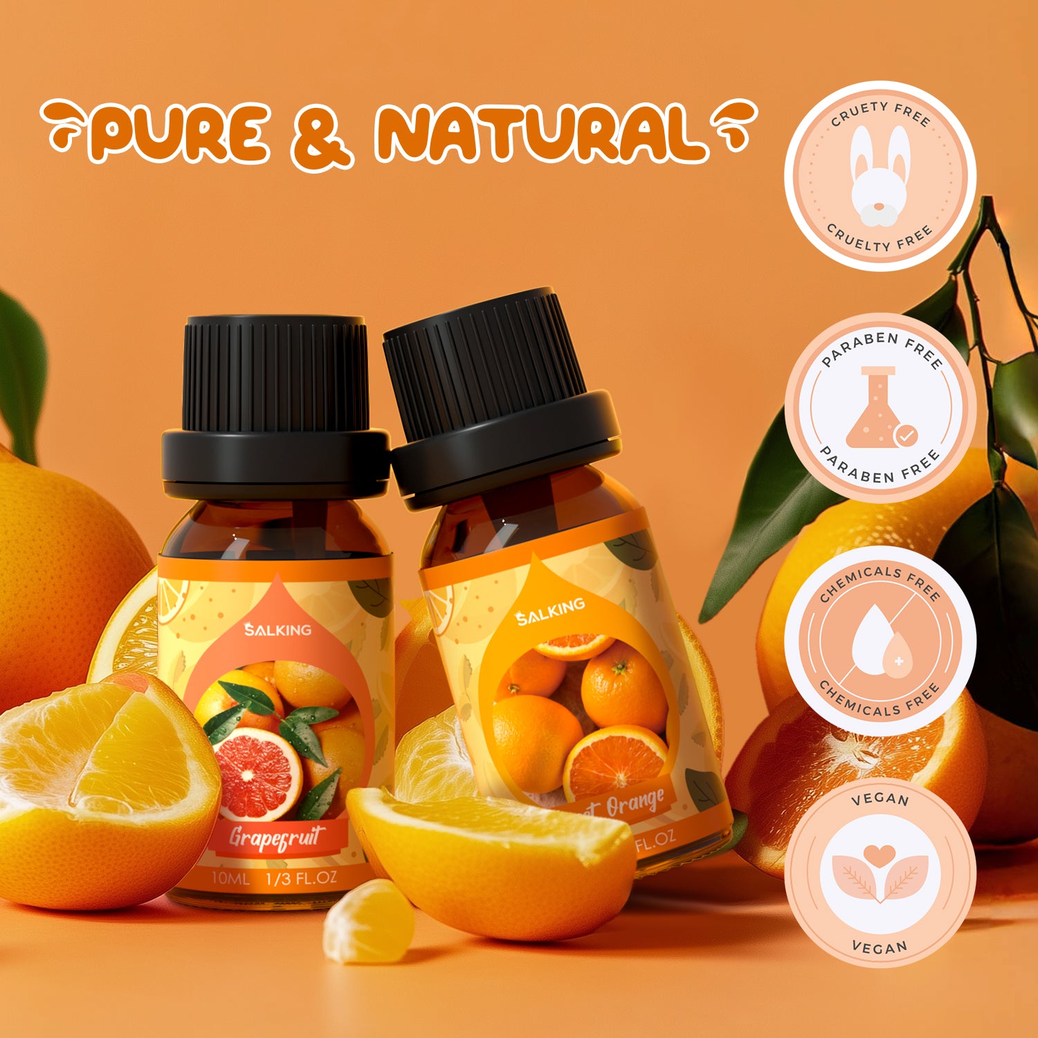 Two bottles of 'Grapefruit' and 'Orange' essential oils with orange slices and leaves on an orange background, featuring 'Pure & Natural' text and various certification logos.